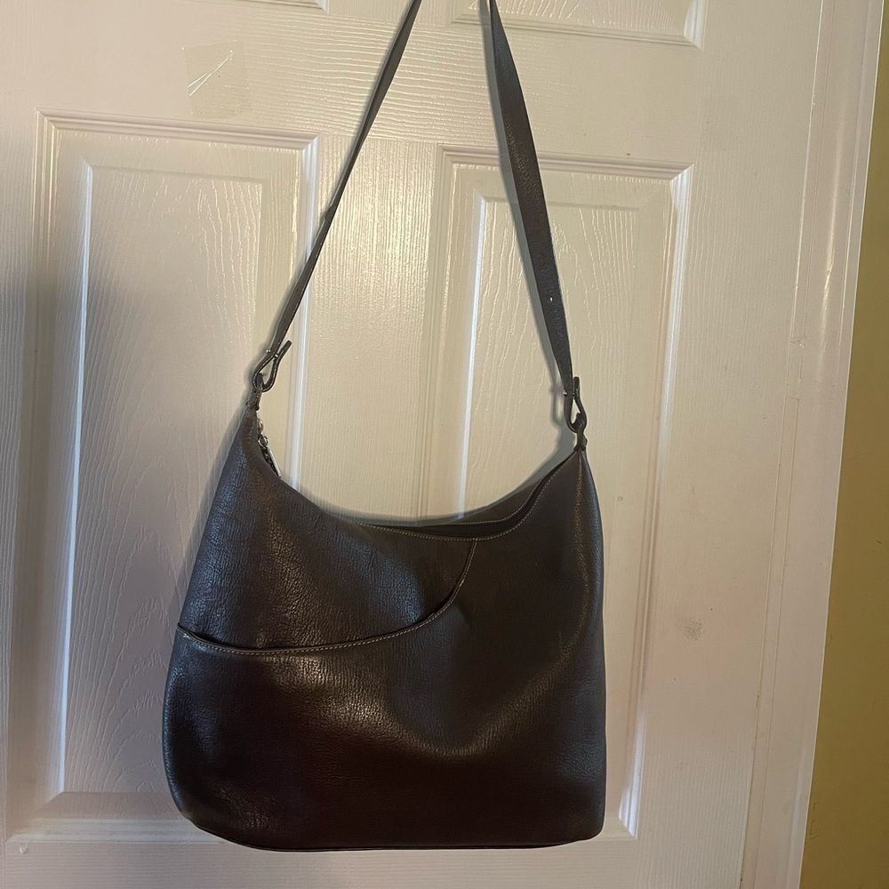 Maxx New York Leather Brown medium shoulder bag with silver tone hardwares.